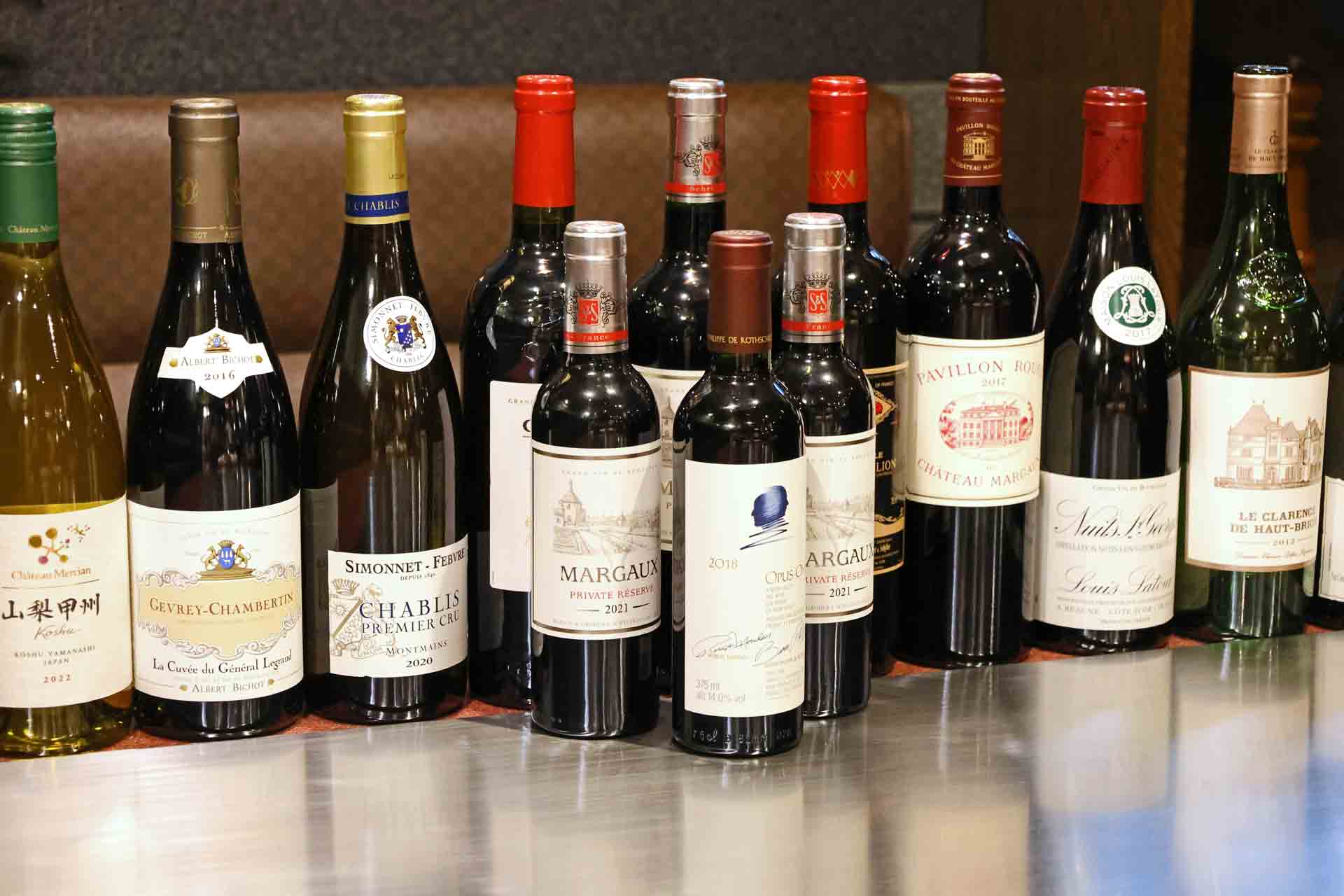 A selection of red and white wine bottles at Steak Serika
